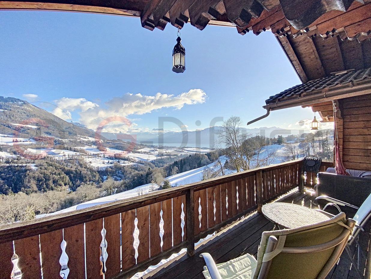 Splendide chalet avec vue panoramique sur le lac et les alpes